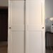 Dulap IKEA de haine cu usi glisante, alb –118x55x199 cm